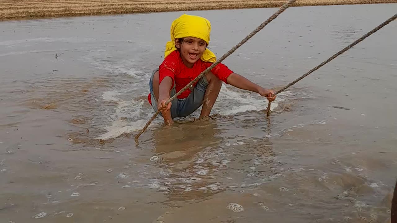 Lovely girl helping her father in his work.