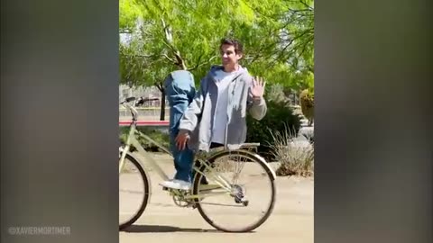 MAN CUT IN HALF ON A BIKE