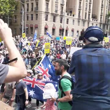 Thousands of people Chant F Dan Adrew's in Melbourne Australia