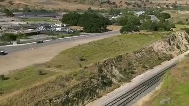 This EPIC Escape Was Caught On Video When Biker Jumped Over Highway