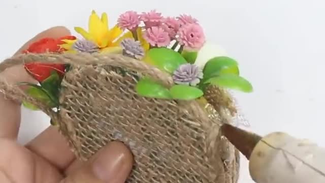 A very unique little flower basket was done in this way