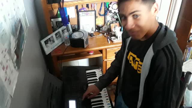 Friend plays on my piano