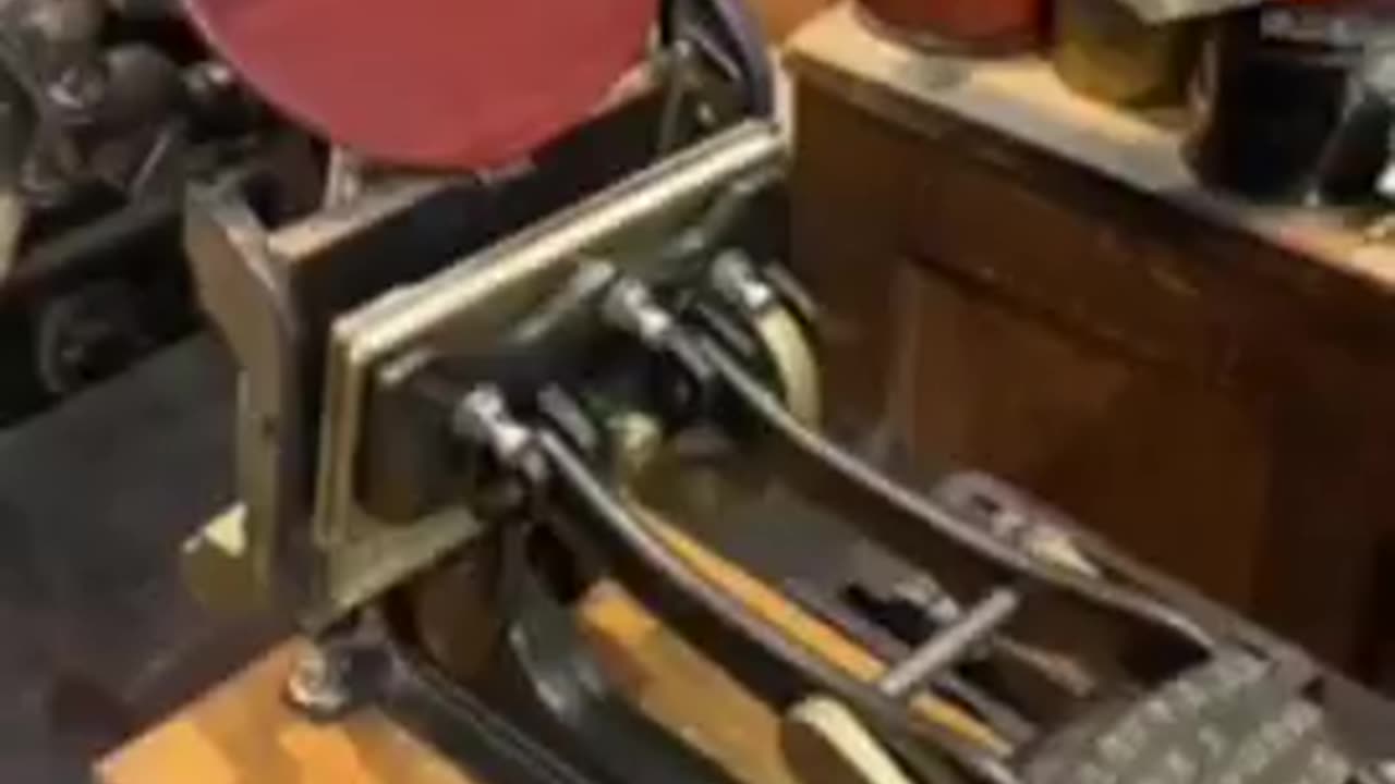 THIS IS AN OLD SCHOOL PRINTING PRESS