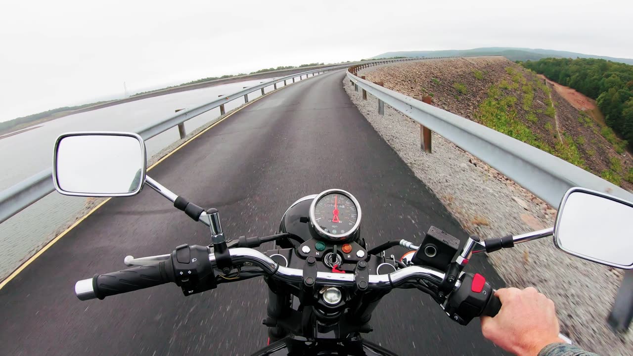 nothing more relaxing than riding a bike on a highway around the sea - lonely