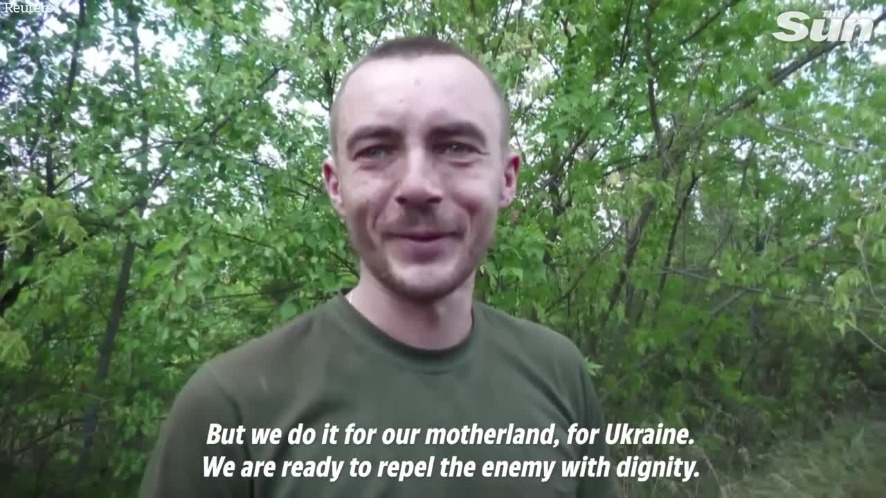 Ukrainian soldiers man frontline as Russian shells bombard Donbas region