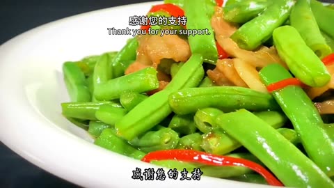 Chinese cuisine recipe, delicious recipe of green beans, simple and nutritious, served on the table