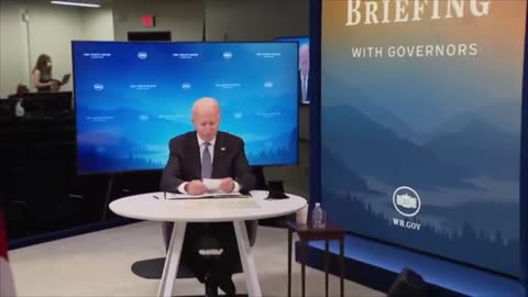 Biden's staffer lets him know about the blob on his chin