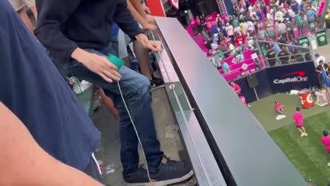 Catching a baseball with a cup and string