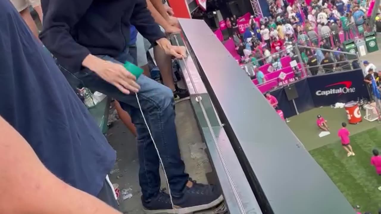 Catching a baseball with a cup and string