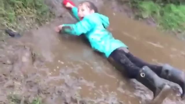 funny dog make her fall in mud