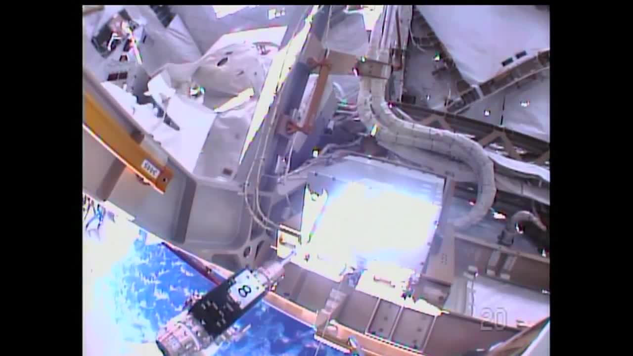 Astronauts Replace Backup Computer During Spacewalk