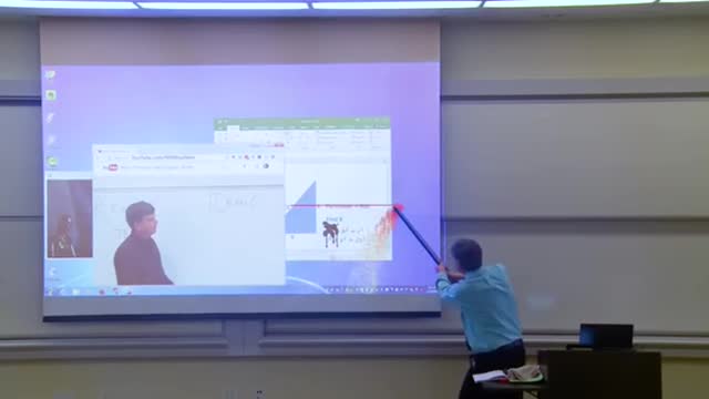 Math professor fixes the projecter screen