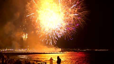 Fireworks illuminating the beach