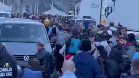 Russians trying to leave for Georgia were allowed to cross the border on foot.