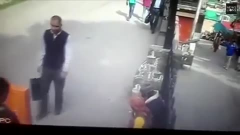 Monkey jumping on people.