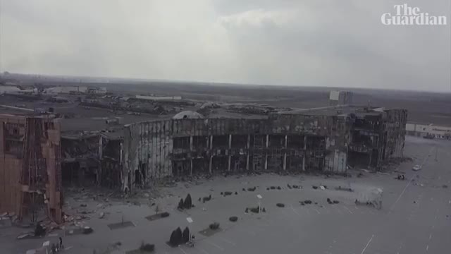 Drone video shows destroyed residential buildings and shopping centre in Ukraine