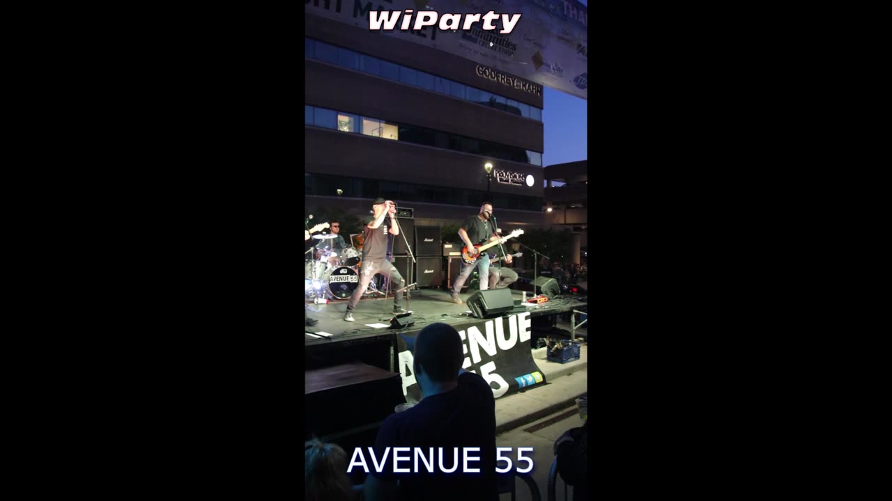 Avenue 55 band playing Foo Fighters song Times Like These at Appleton's Light the Night Market