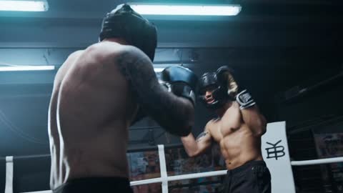 Two Boxers In A Sparring Match