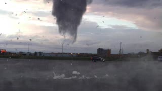 short tornado on the parking