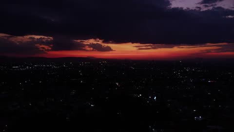 Tour high above a city at dusk