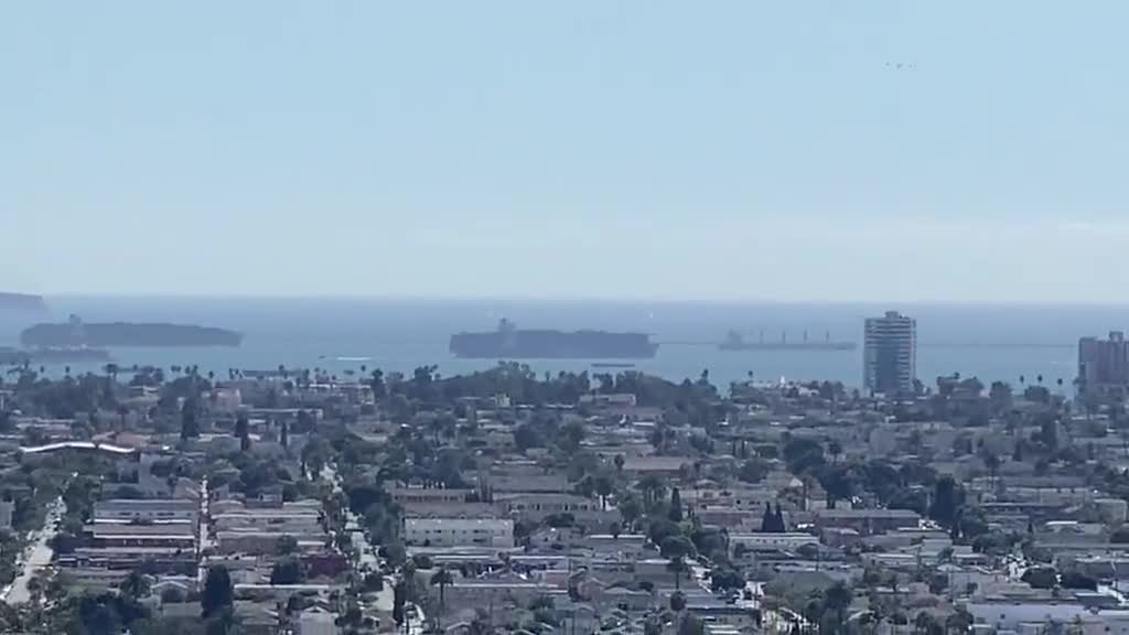 NEW - Cargo ships full of goods are stuck outside California harbors