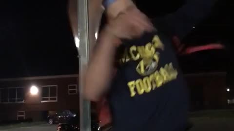 Boy slams head street sign
