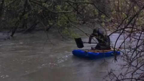 Man uses bed frame and snowshovel as canoe and paddle