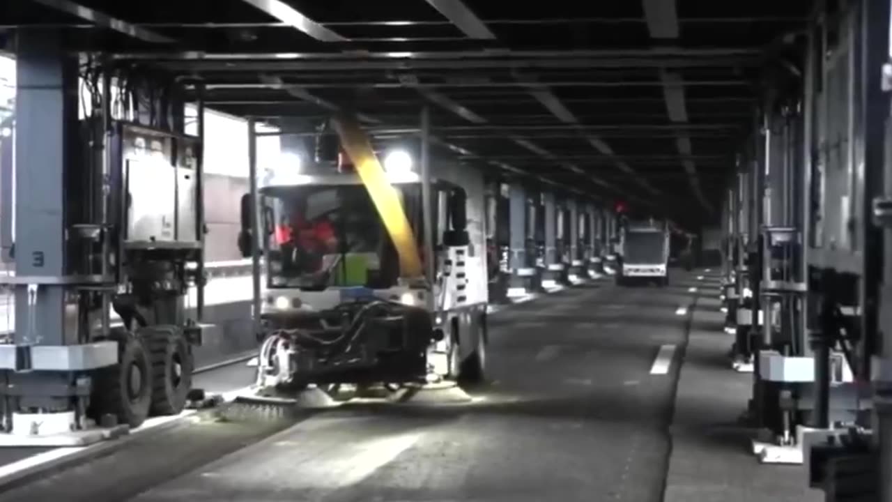 In Switzerland, mobile overpass bridges are used to carry out road work without stopping traffic