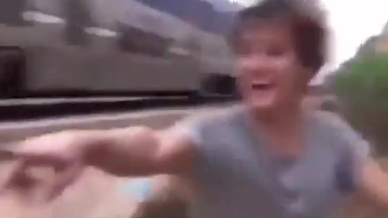 Skaters Inches From Train