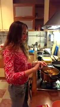 Beautifull Russian girl cooking in Russian House in Real life