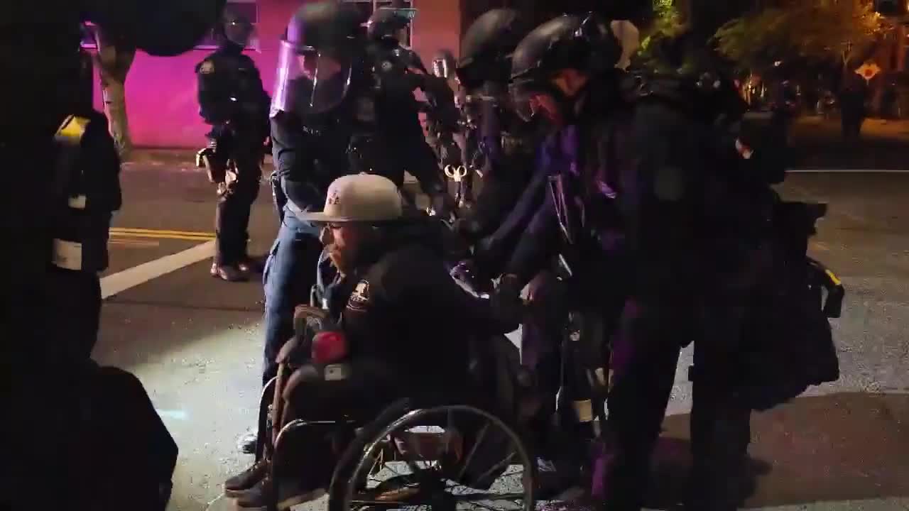 Disabled Antifa foot soldier, Dustin “wheels,” being arrested at Portland Protests