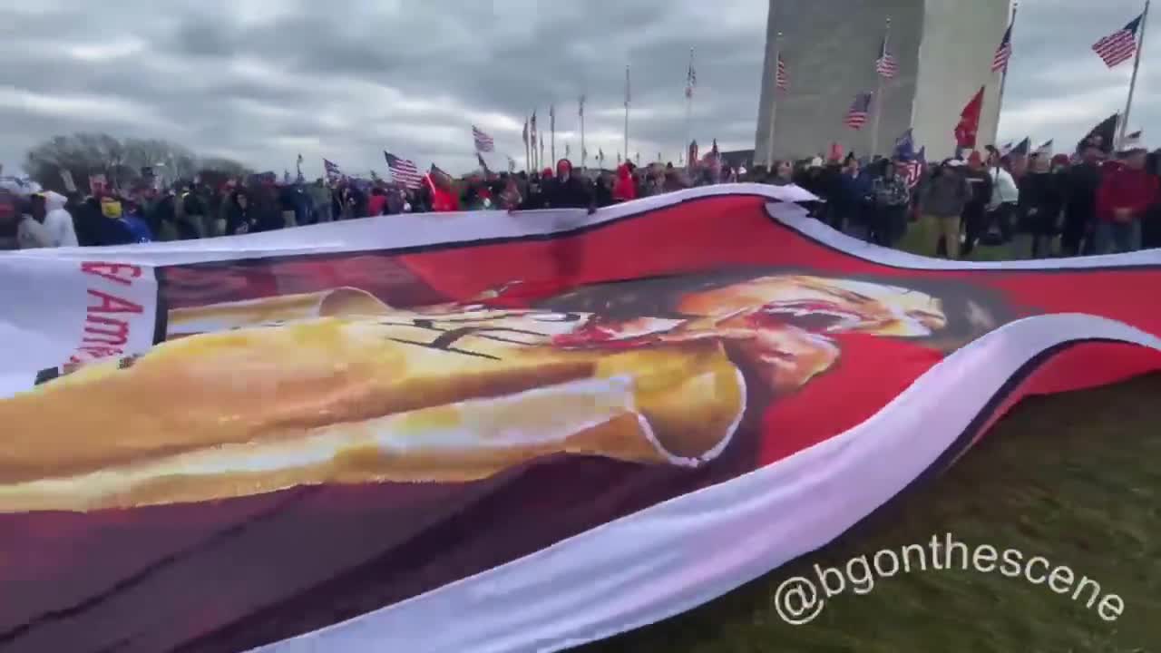 Patriots unfurl a banner of Pelosi