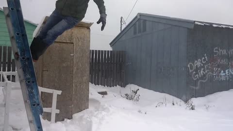 Lady jumps off ladder to snow