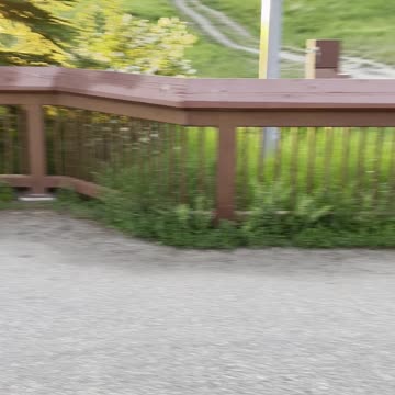 Beautiful flowers beside bridge entrance