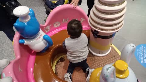 Baby playing in amusement parks