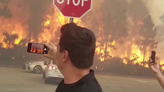 Fast Fire Rushes Toward Onlookers