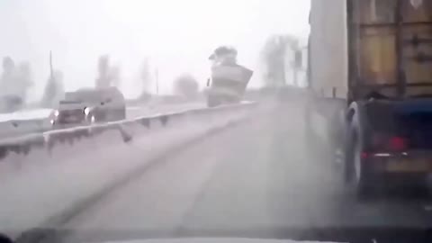 Terrifying Dash Cam Footage - Truck overturns across motorway