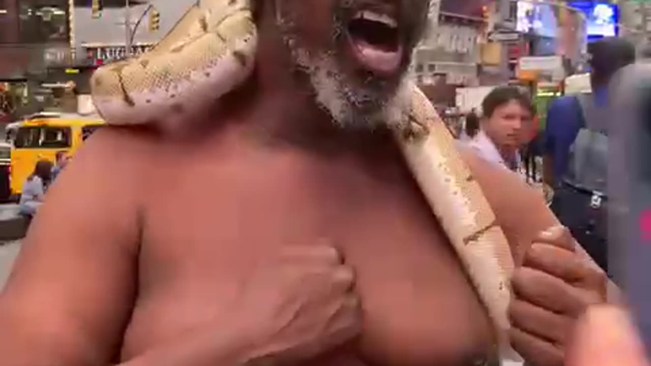 Bum Channels Tarzan with a Snake! 😂 #StreetComedy #NYC #FunnyShorts #LOL