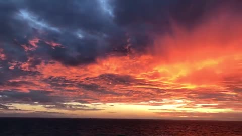 The flames of the sky, igniting the evening clouds