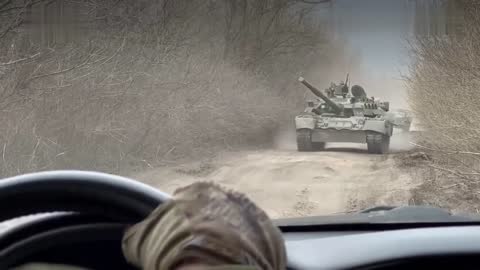 Russian equipment under the cover of Ka-52 helicopters in the Kharkiv region