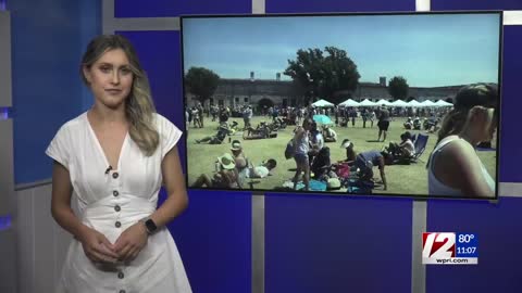 Crowds gather at Newport Folk Festival despite heat wave