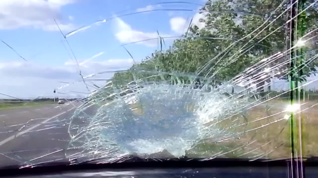 Huge Rock Hits Windshield