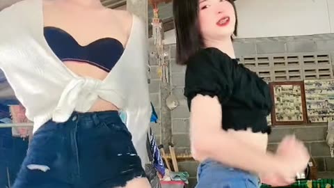 Two ladyboys dance to you