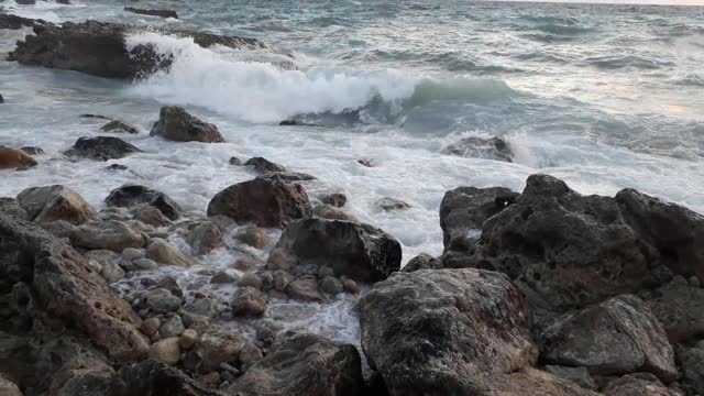 waves and the beach and the rocks