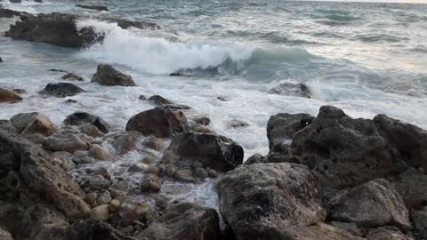 waves and the beach and the rocks