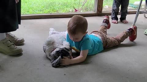 David loving on Pebbles at Grammy's