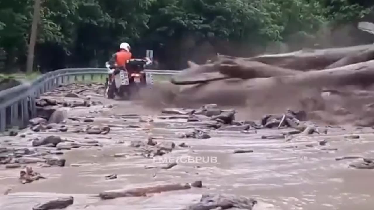Unaware Biker vs Landslide