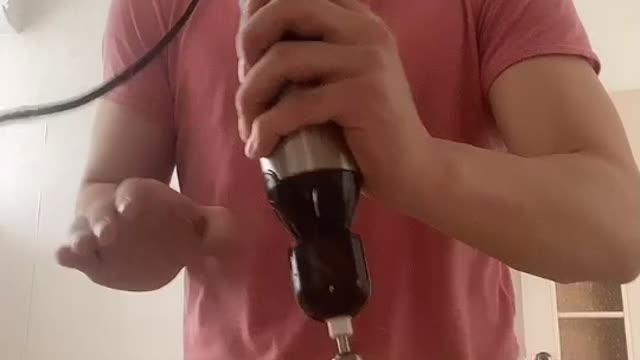 Guy Using Mixer Sends Glass into Perpetual Motion