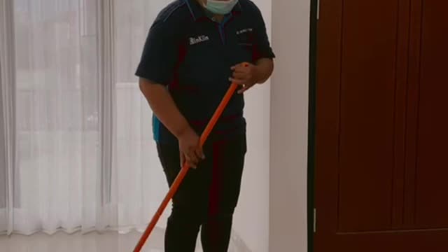 this officer is very good at cleaning the floor manually