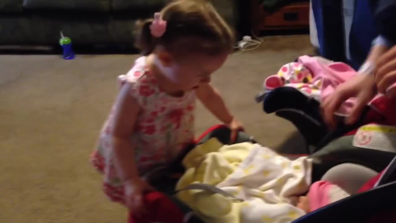 Excited Toddler Meets Her Twin Baby Sisters